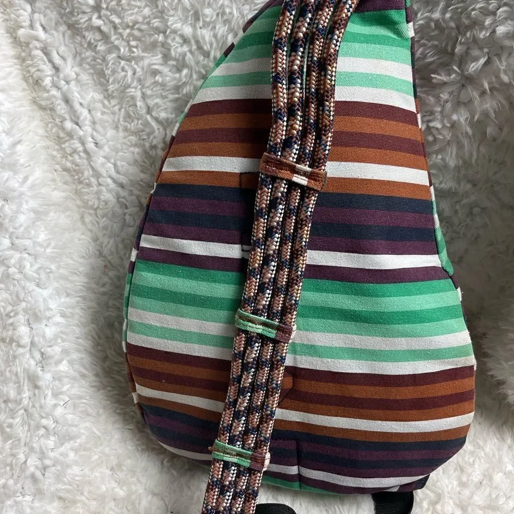 Kavu Rope sling back/ crossbody bag Canvas stripes Aztec color padded back .